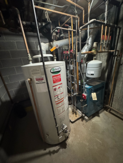Boiler and water heater with connected heating and hot water piping