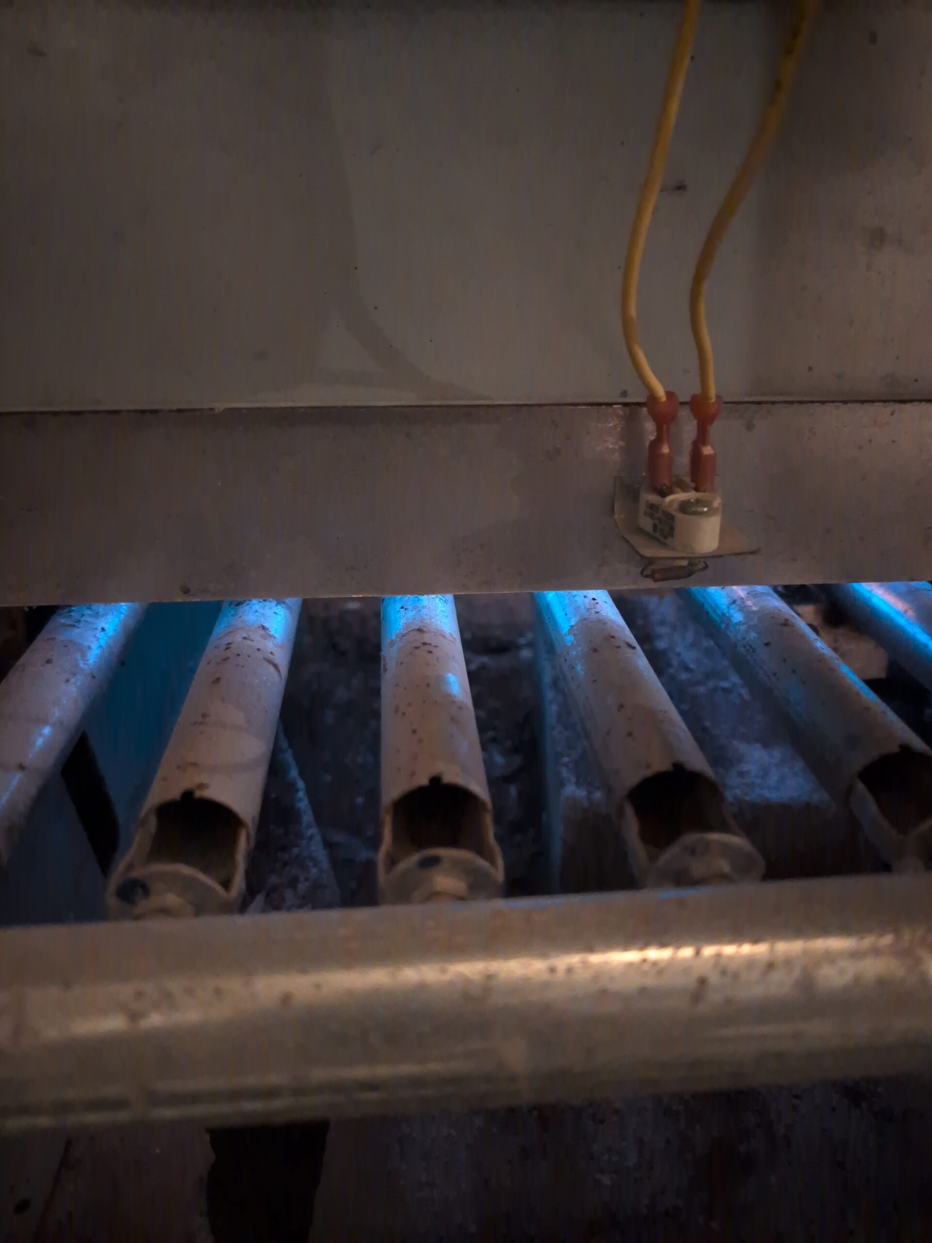 Close-up of boiler burner assembly during operation