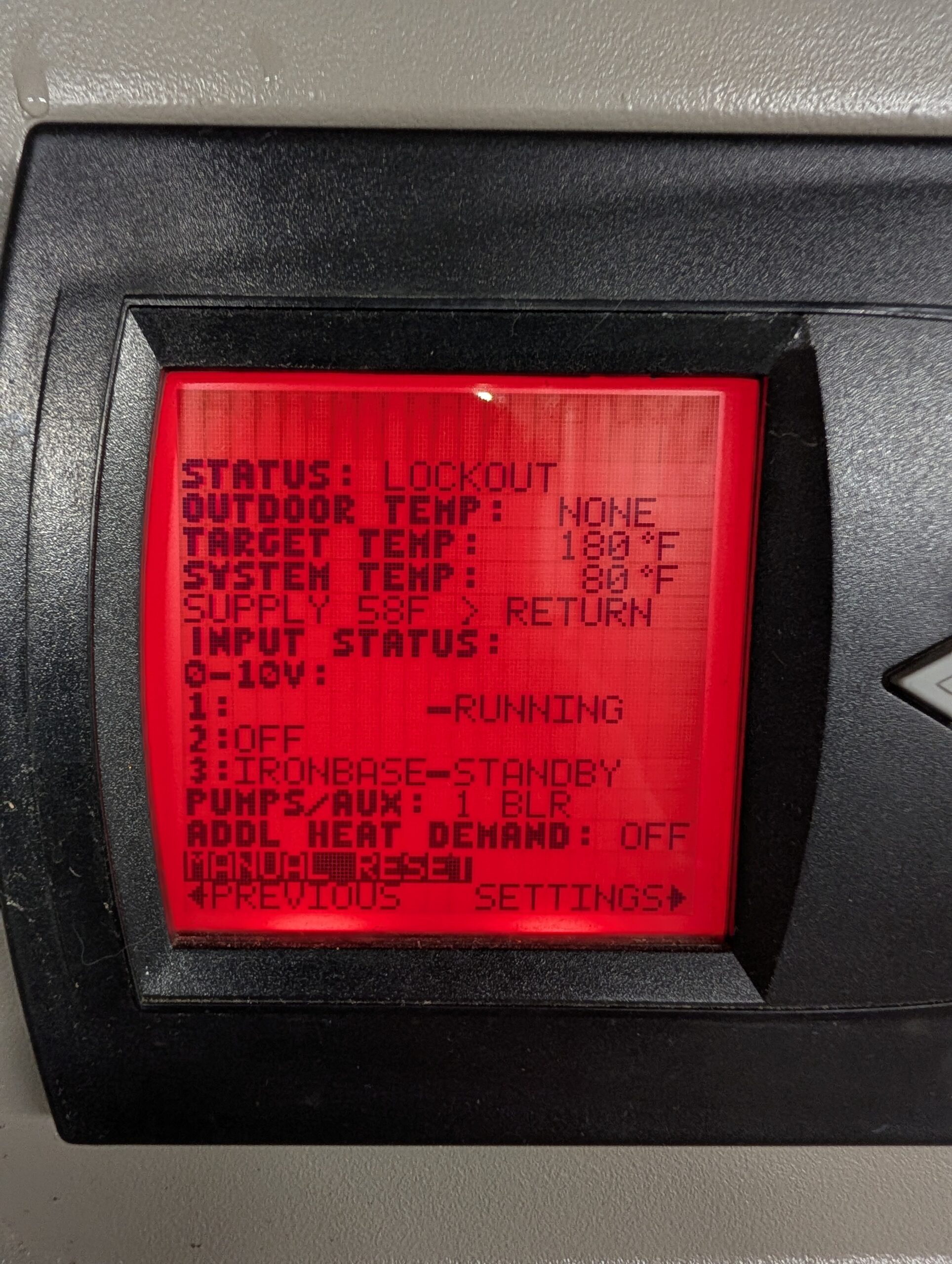 Boiler control display showing a lockout status